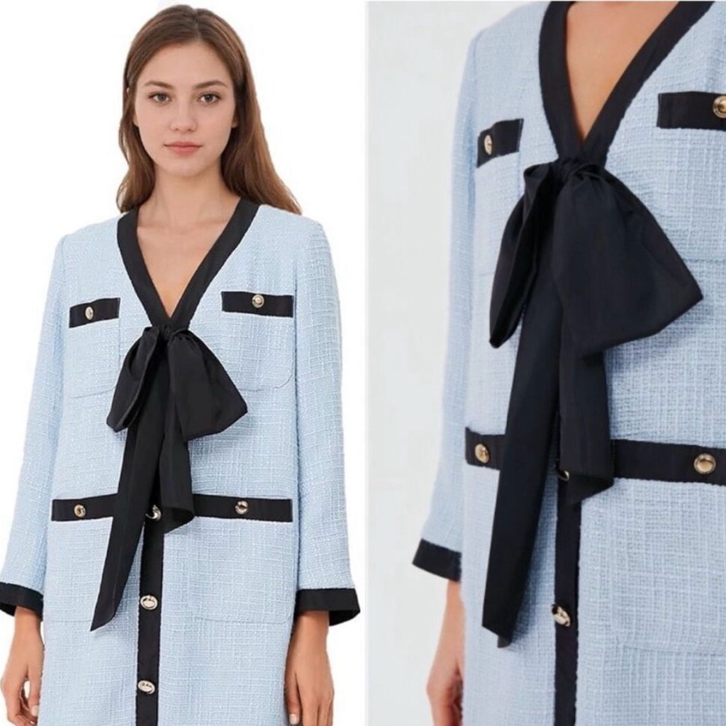 Elegant Light Blue Jacket With Black Accents
